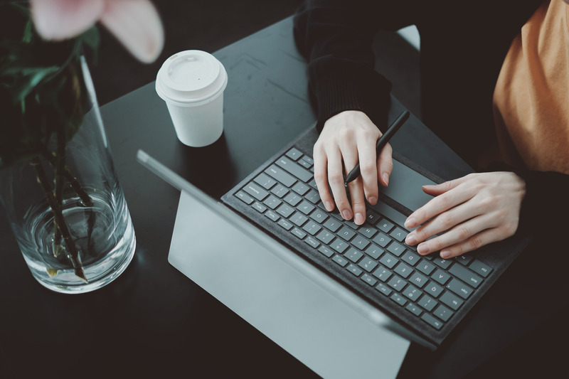 Professional working at a modern desk